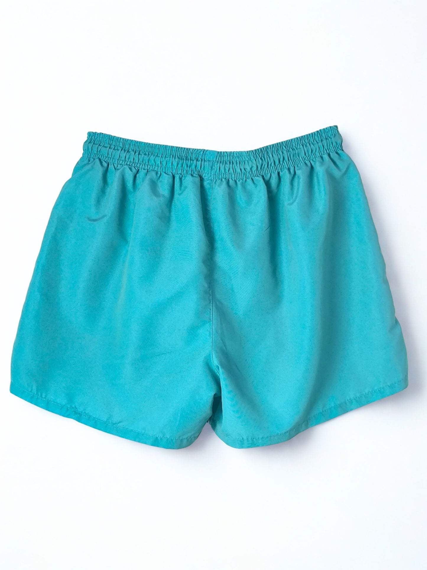 Retro Umbro Swim Shorts – Turquoise with Tribal Flame Print