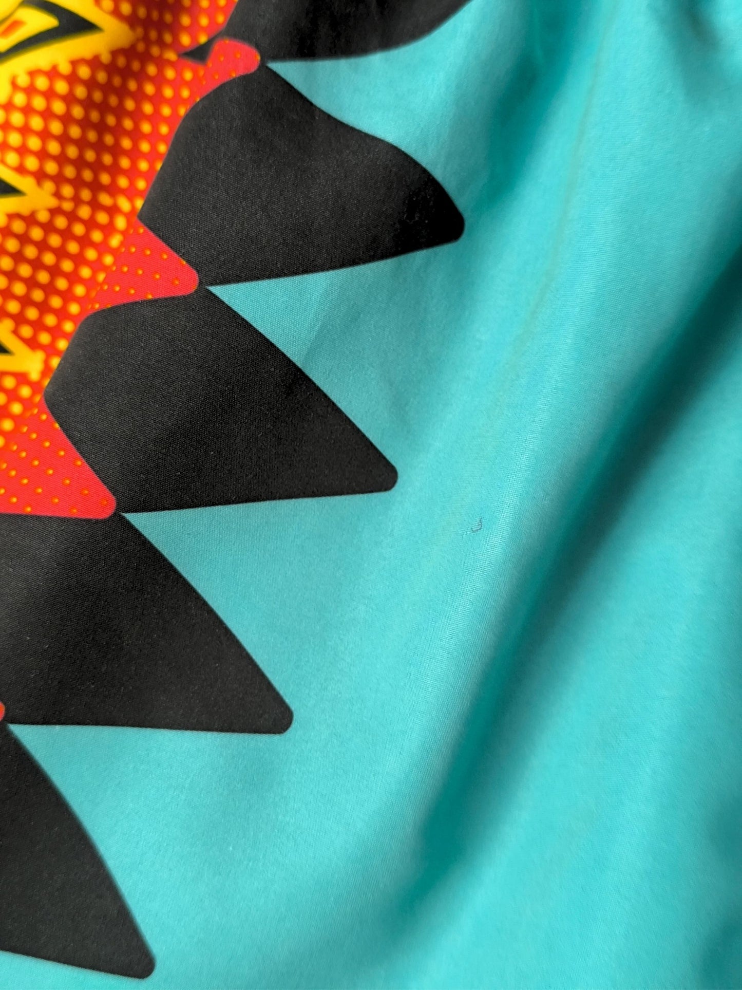 Retro Umbro Swim Shorts – Turquoise with Tribal Flame Print